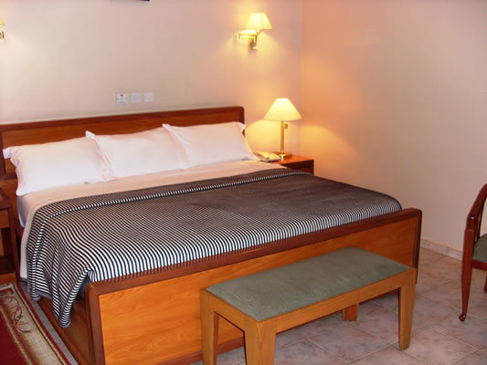 /web/uploads/116/Welcome Centre Hotels/room-photos/Standard room /Standard-Room-Bedroom.jpg